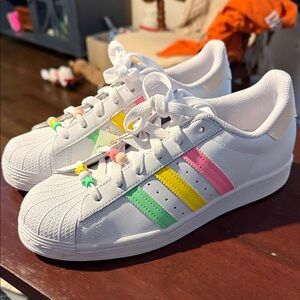 Adidas Kids' White Sneakers with Pink, Yellow, and Green Stripes